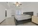 Bedroom featuring wood-look floors, a ceiling fan and a large window at 9000 Las Vegas Blvd # 1004, Las Vegas, NV 89123