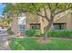 A well-maintained building exterior with tidy landscaping featuring a healthy shade tree at 9000 Las Vegas Blvd # 1004, Las Vegas, NV 89123