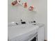Laundry room with white washer and dryer and storage shelf at 9000 Las Vegas Blvd # 1004, Las Vegas, NV 89123