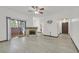 Bright living room with fireplace, sliding glass doors to balcony, and tile floors at 9000 Las Vegas Blvd # 1004, Las Vegas, NV 89123