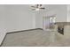 Spacious living room with sliding glass doors to balcony, fireplace and tile flooring at 9000 Las Vegas Blvd # 1004, Las Vegas, NV 89123