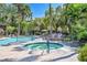 Hot tub near pool with lounge chairs and lush landscaping at 9000 Las Vegas Blvd # 1004, Las Vegas, NV 89123