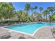 Community pool featuring lounge chairs and mature landscaping at 9000 Las Vegas Blvd # 1004, Las Vegas, NV 89123