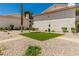 Well maintained common area of condos with artificial grass and drought resistant landscaping at 905 Sulphur Springs Ln # 101, Las Vegas, NV 89128