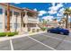A well-maintained condo complex with desert landscaping at 905 Sulphur Springs Ln # 101, Las Vegas, NV 89128