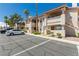 Exterior view of a well-maintained two-story condo with parking at 905 Sulphur Springs Ln # 101, Las Vegas, NV 89128