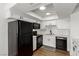 Modern kitchen featuring stainless steel appliances and ample cabinetry at 905 Sulphur Springs Ln # 101, Las Vegas, NV 89128
