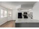 Eat-in kitchen with white cabinetry, black appliances, and new countertops at 905 Sulphur Springs Ln # 101, Las Vegas, NV 89128