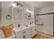 Bright bathroom with double sink vanity and glass-enclosed shower at 9303 Gilcrease Ave # 1245, Las Vegas, NV 89149