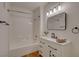 Bathroom featuring a stylish vanity and a shower-tub combination at 9303 Gilcrease Ave # 1245, Las Vegas, NV 89149