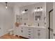 Modern bathroom featuring double sink vanity and walk in shower at 9303 Gilcrease Ave # 1245, Las Vegas, NV 89149