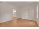 Bedroom showing wood floors, closet, and ensuite bathroom at 9303 Gilcrease Ave # 1245, Las Vegas, NV 89149