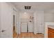 Laundry room with washer, dryer and storage shelves at 9303 Gilcrease Ave # 1245, Las Vegas, NV 89149
