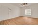 Light and airy living room featuring wood floors and a front door entrance at 9303 Gilcrease Ave # 1245, Las Vegas, NV 89149