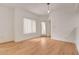 Cozy living room with wood floors, natural light, and a patio door at 9303 Gilcrease Ave # 1245, Las Vegas, NV 89149