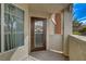 Enclosed patio featuring a glass door and stucco walls at 9303 Gilcrease Ave # 1245, Las Vegas, NV 89149