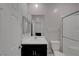 Bright bathroom with a shower and bath combination, and a sleek vanity at 10142 Skye Saddle Ave, Las Vegas, NV 89166