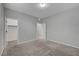 This bedroom features neutral walls, soft carpeting, and closet with ample storage space at 10142 Skye Saddle Ave, Las Vegas, NV 89166
