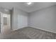 Neutral walls, soft carpeting and closet storage highlight this simple bedroom at 10142 Skye Saddle Ave, Las Vegas, NV 89166