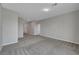 Large bonus room with neutral carpet, ideal for versatile use such as a play area or home office at 10142 Skye Saddle Ave, Las Vegas, NV 89166