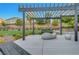 Relaxing community park featuring benches, unique seating, and well-maintained landscaping at 10142 Skye Saddle Ave, Las Vegas, NV 89166