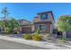 Charming two-story home featuring a two-car garage and professionally landscaped front yard at 10142 Skye Saddle Ave, Las Vegas, NV 89166