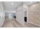 Hallway leading to an open floorplan and back yard access at 10142 Skye Saddle Ave, Las Vegas, NV 89166