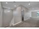 Upstairs hallway with neutral carpet and white trim leads to additional living spaces at 10142 Skye Saddle Ave, Las Vegas, NV 89166