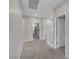 Upstairs hallway with neutral carpet and white trim, offering access to other rooms at 10142 Skye Saddle Ave, Las Vegas, NV 89166