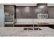 Kitchen close-up, featuring stainless steel appliances, granite countertops, and subway tile backsplash at 10142 Skye Saddle Ave, Las Vegas, NV 89166