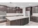 Well-appointed kitchen island with stainless steel appliances and modern cabinetry at 10142 Skye Saddle Ave, Las Vegas, NV 89166