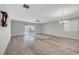 Open-concept living room with lots of natural light and backyard access at 10142 Skye Saddle Ave, Las Vegas, NV 89166