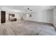 Spacious living room boasts hard floors, recessed lighting, and a ceiling fan at 10142 Skye Saddle Ave, Las Vegas, NV 89166
