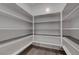 Walk-in pantry with ample shelving space for organized storage at 10142 Skye Saddle Ave, Las Vegas, NV 89166