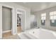 Large bathroom features a separate shower and a walk-in closet at 10392 Smokemont Ct, Las Vegas, NV 89129
