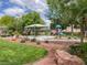Neighborhood park with shelter, playground, garden, and manicured landscaping at 10392 Smokemont Ct, Las Vegas, NV 89129