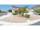 Two-story home in the desert with mature landscaping at 10392 Smokemont Ct, Las Vegas, NV 89129