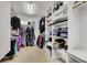 Spacious walk-in closet featuring custom shelving and ample storage for clothes and accessories at 10392 Smokemont Ct, Las Vegas, NV 89129