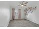 Bedroom features modern fan and floral wallpaper at 11009 Pentland Downs St, Las Vegas, NV 89141