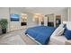 Bright bedroom featuring ensuite bath, walk-in closet, and stylish interior design elements at 12296 Kings Eagle St, Las Vegas, NV 89141