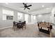 Expansive game room with foosball table and dining area, perfect for entertaining at 12705 Coastline Shadow St, Las Vegas, NV 89141