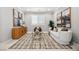 Elegant living room featuring stylish decor, comfortable seating, and natural light at 12705 Coastline Shadow St, Las Vegas, NV 89141