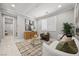 Comfortable living room boasts stylish decor, with neutral tones and modern furnishings at 12705 Coastline Shadow St, Las Vegas, NV 89141