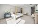 Spacious main bedroom with a canopy bed, elegant furnishings, and ample natural light at 12705 Coastline Shadow St, Las Vegas, NV 89141