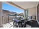 Outdoor patio providing mountain views, comfortable seating, and an inviting space for relaxation at 12705 Coastline Shadow St, Las Vegas, NV 89141