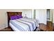 Comfortable bedroom featuring stylish bedding and neutral decor at 1605 Crimson Hills Dr # 204, Las Vegas, NV 89128