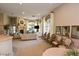 The community clubhouse has seating, a fireplace, a television and large windows at 1605 Crimson Hills Dr # 204, Las Vegas, NV 89128