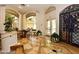 An entrance to the clubhouse has a seating area, marble floors and an elaborate display cabinet at 1605 Crimson Hills Dr # 204, Las Vegas, NV 89128