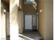 Condo entrance featuring secure access and well-lit walkway at 1605 Crimson Hills Dr # 204, Las Vegas, NV 89128