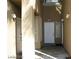 Private, covered front entryway leading to the front door and second entry at 1605 Crimson Hills Dr # 204, Las Vegas, NV 89128